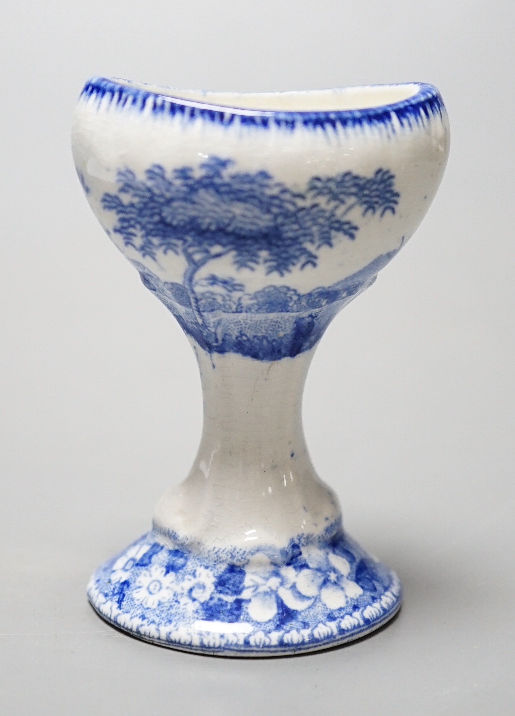 A Spode blue and white transfer printed pottery eye bath, early 19th century 6.9cm high